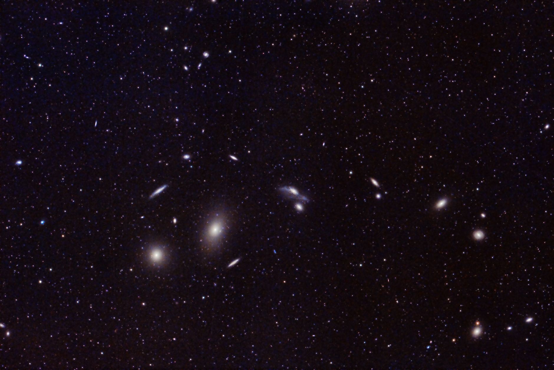 Hubble's Cosmic Ballet: A Swarm of Galaxies Unveiled